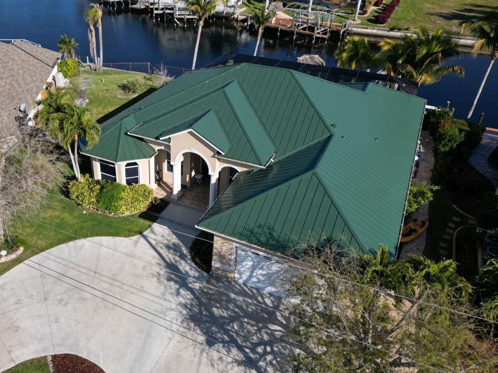 Metal Standing seam & architectural Standing seam Hunter Green roof installed in Cape Coral