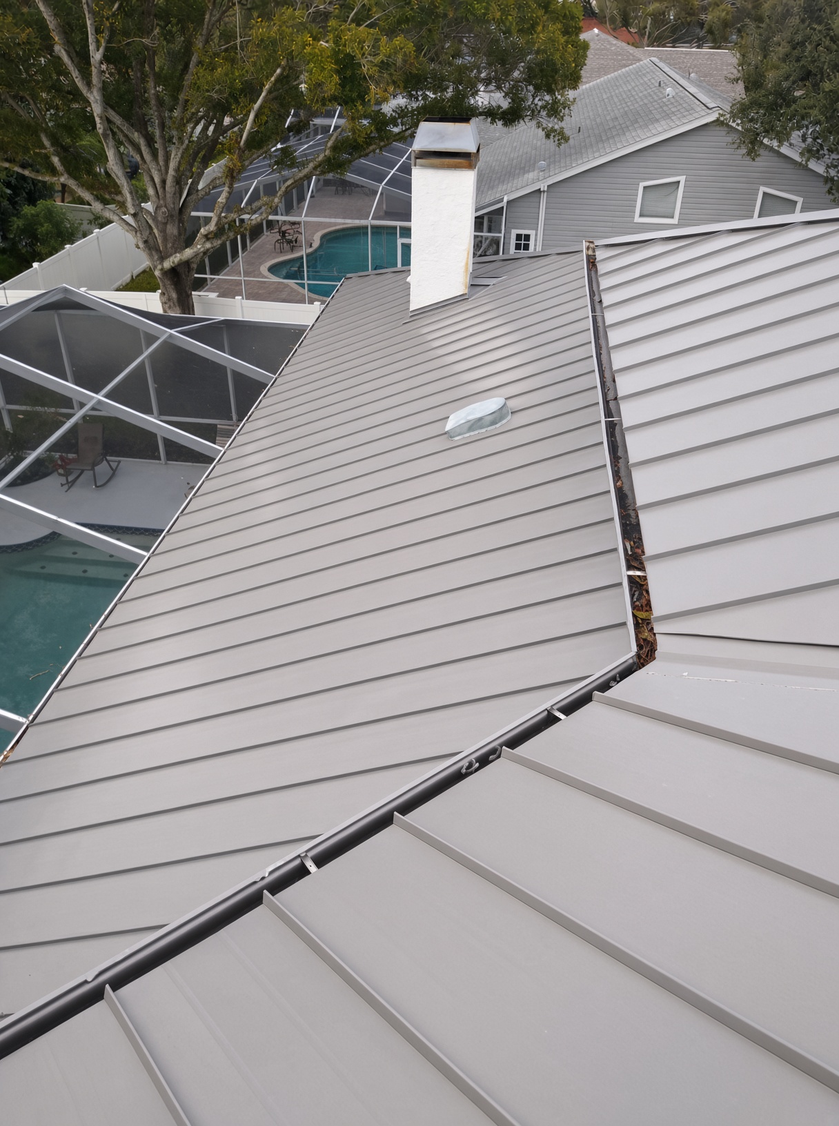 Metal Standing seam & architectural Standing seam Slate Grey roof installed in Cape Coral